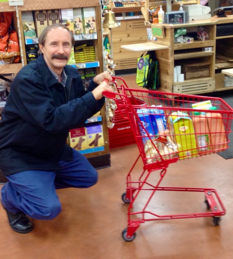 Yin Yoga Podcast - Inspire Health, 2020 Paulie Zink shopping with a kiddie cart in the grocery store