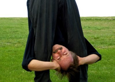 Yin Yoga Poses Paulie Zink demonstrating Philosopher Gazes at the Moon Yin yoga pose