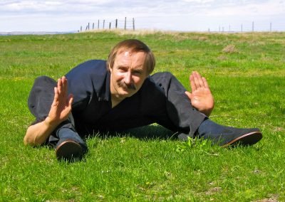 Yin Yoga Poses Paulie Zink demonstrating Sitting Crab pose