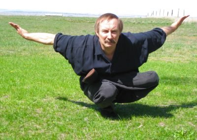 Yin Yoga Poses Paulie Zink demonstrating Phoenix Yin yoga pose