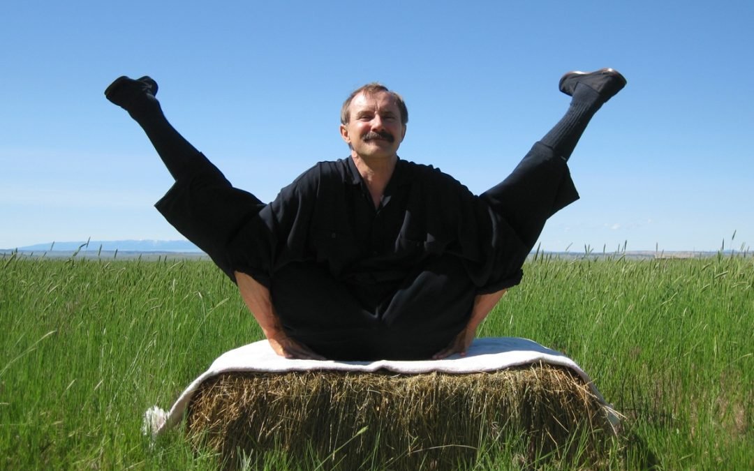 Paulie Zink does advanced sitting Crab Yin yoga pose
