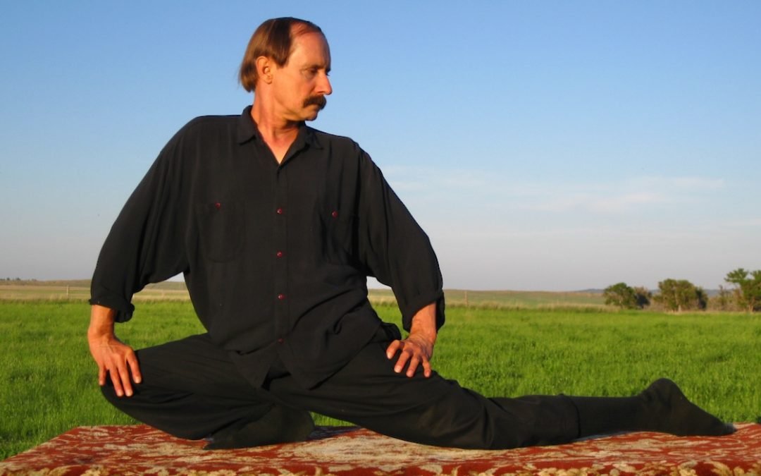 Paulie Zink does a very advanced Yin yoga Dragon pose